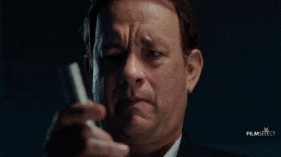 75 Movies Set in European Destinations to Inspire Your Next Trip 62 GIF of Robert Langdon (Tom Hanks) in a suspenseful moment from Dan Brown's Inferno film.