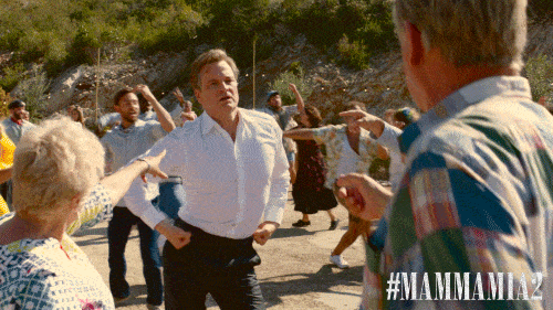 75 Movies Set in European Destinations to Inspire Your Next Trip 41 GIF from from Mamma Mia! Here We Go Again — a group dancing scene (the film was shot primarily on Vis Island, Croatia, standing in for the fictional Greek island of Kalokairi).