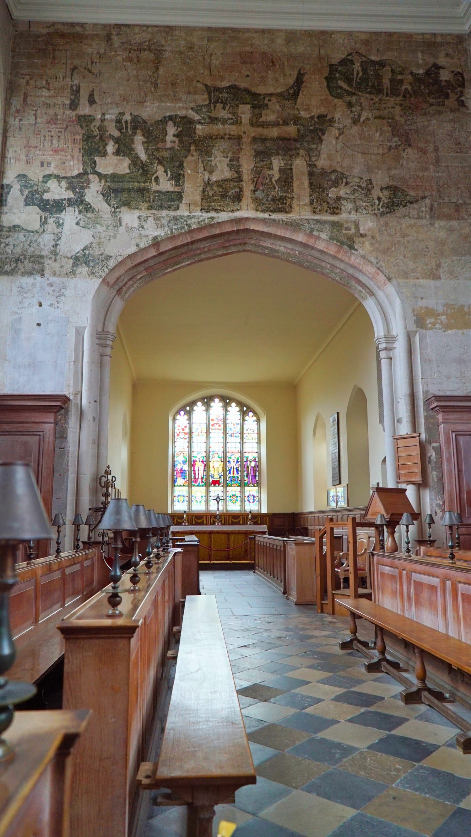Is the Stratford Town Walk Worth It? A Review of the Guided Tour of Shakespeare's Hometown, Stratford-upon-Avon 8 Partially restored medieval mural inside the Guild Chapel in Stratford-upon-Avon, England, United Kingdom, featuring faded religious imagery painted directly onto the stone wall. The artwork, once whitewashed during the Reformation, reveals intricate figures and scenes from Christian teachings, offering a glimpse into the chapel’s historic and spiritual past.