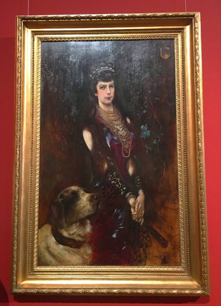 Is Vienna, Austria, Worth Visiting? 13 Pros and Cons to Consider Before You Go 8 Painting of woman and dog at Belvedere Palace