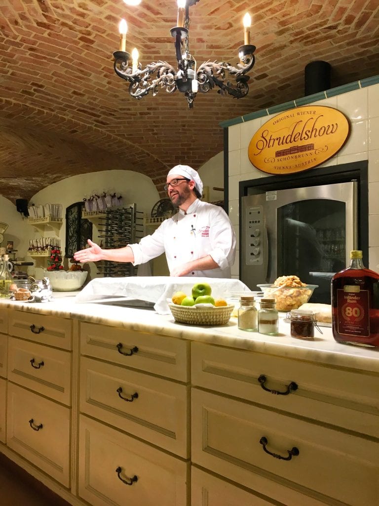 Where to Stay in Vienna, Austria: My Favorite Areas + Best Budget Hotels 8 Baker at Apple Strudel Show at Schönbrunn Palace in Vienna Austria