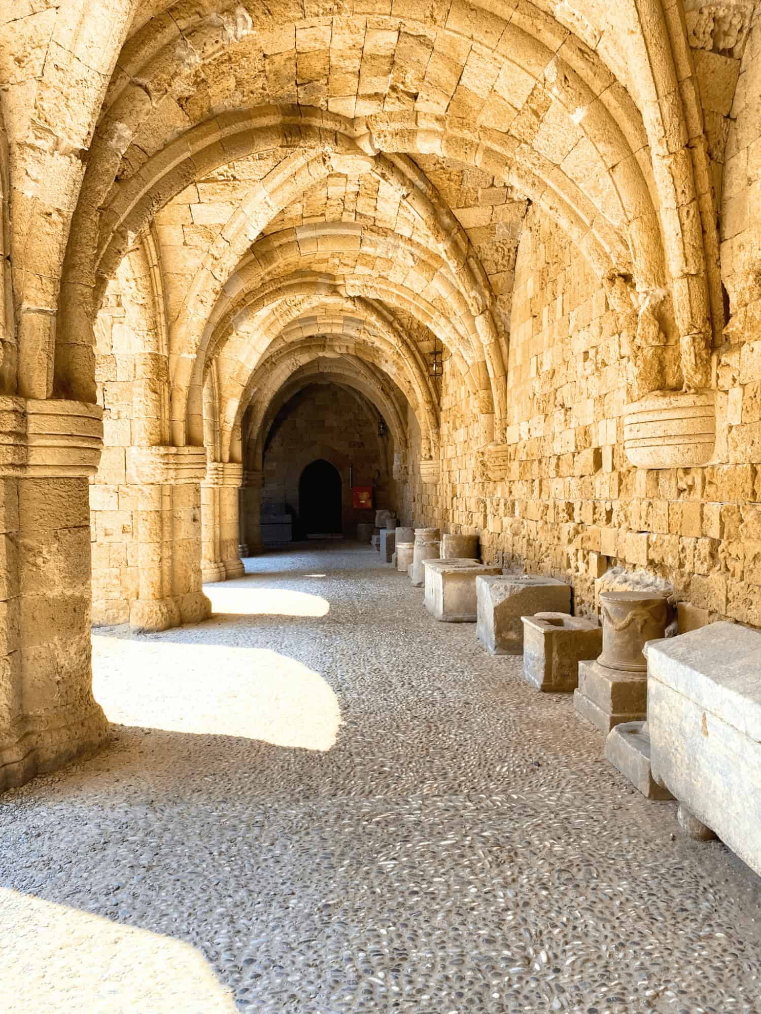 Travel Guide for Rhodes, Greece: Everything First-Time Visitors Need to Know 7 Arched Hallway at the Archaeological Museum of Rhodes in Greece
