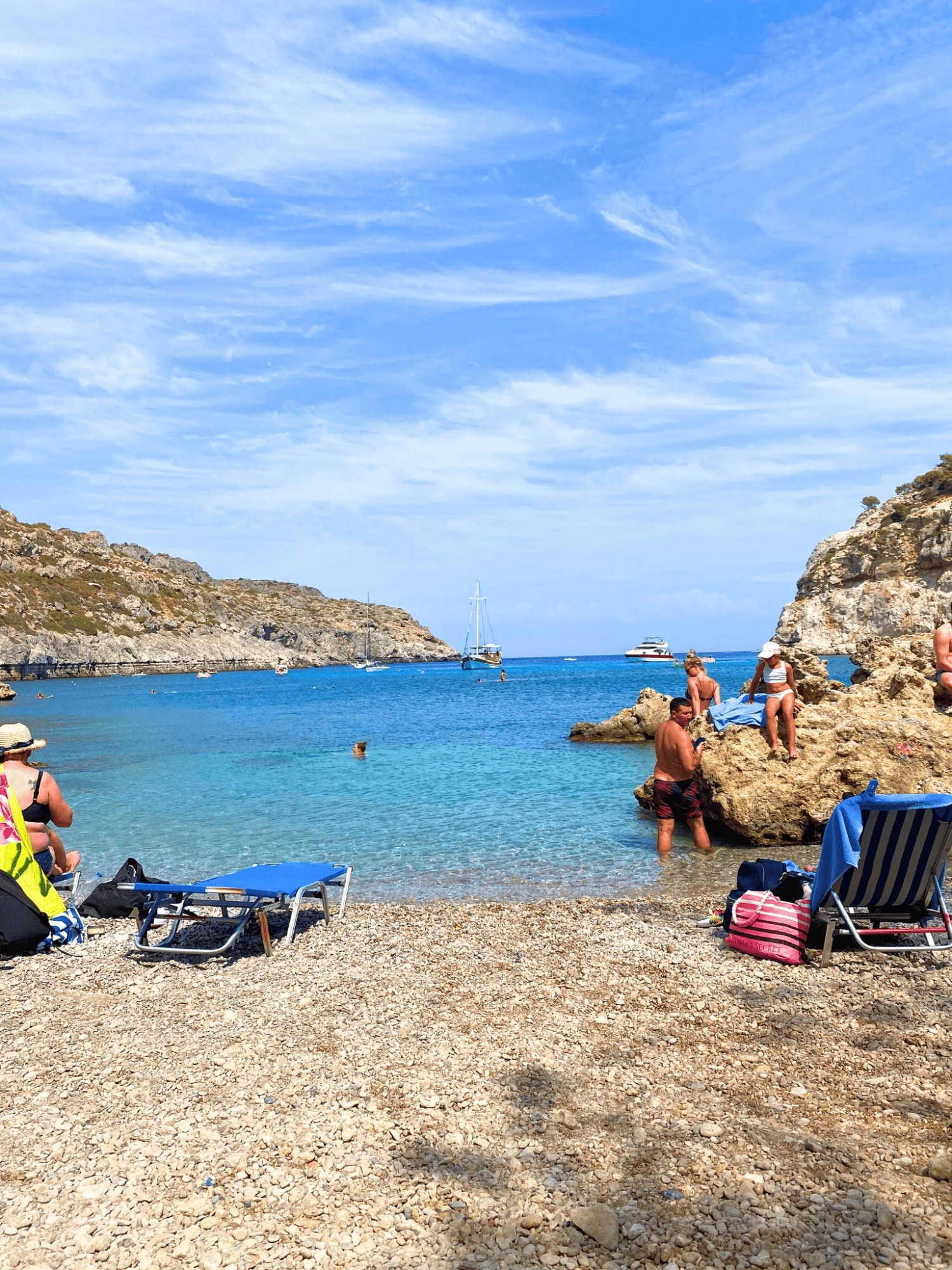 What to Wear in Greece: A Practical Packing List for Women 2 Stunning Ladiko Bay on the beautiful island of Rhodes, Greece.