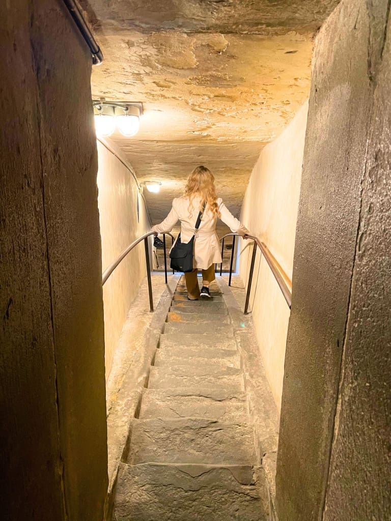 Looking for a Travel Companion? the Best Questions to Ask Before Your Next Trip 7 Woman descending steep stairs in Florence's Duomo di Firenze