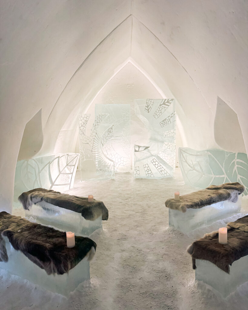 The Best Hotels in Rovaniemi, Finland: Comparing My Glass Igloo Stay with the City Center 51 Arctic SnowHotel Chapel in Lapland Finland.