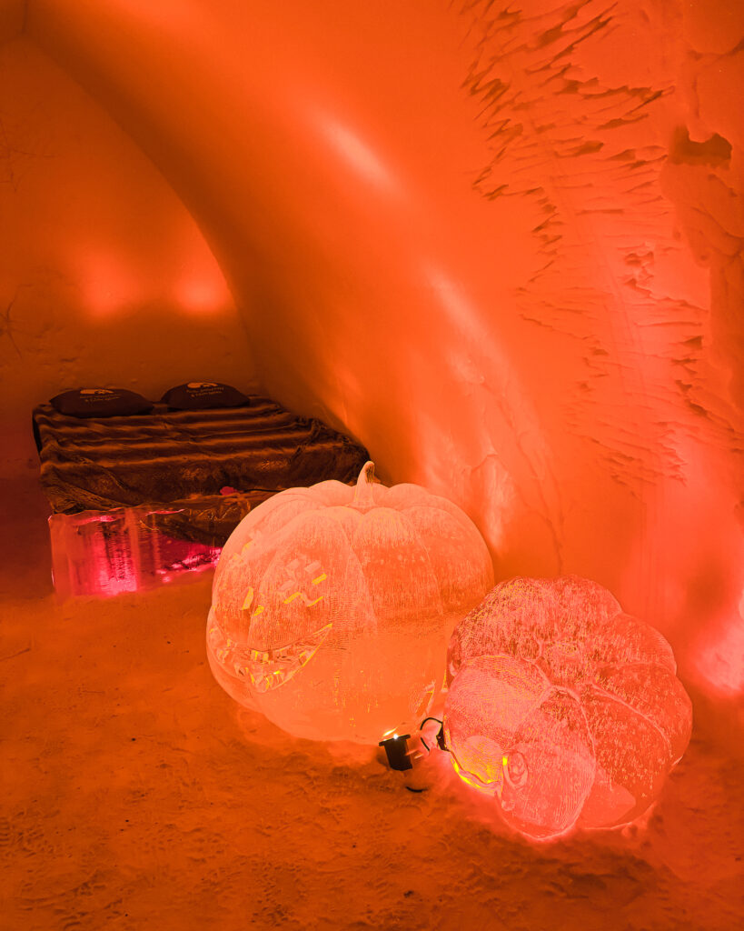 The Best Hotels in Rovaniemi, Finland: Comparing My Glass Igloo Stay with the City Center 29 Arctic SnowHotels cozy pumpkin room, a unique winter experience.
