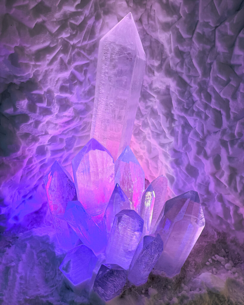 Are These 10 Rovaniemi Restaurants Worth Trying? Arctic Cuisine Dining Guide 19 Stunning purple crystal ice sculpture at Arctic SnowHotel Ice Restaurant.