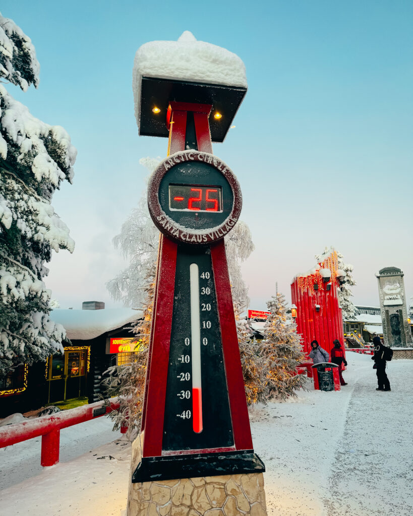 The Best Hotels in Rovaniemi, Finland: Comparing My Glass Igloo Stay with the City Center 61 Arctic thermometer display in Santas Village, Rovaniemi.