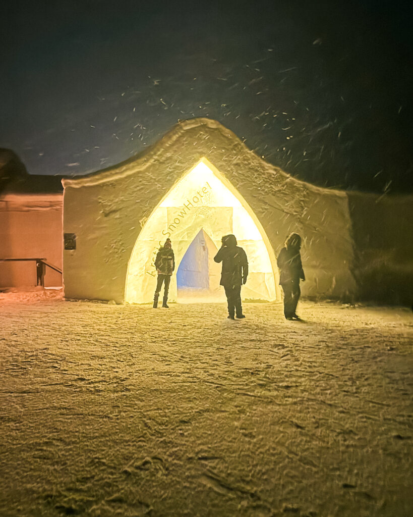 The Best Hotels in Rovaniemi, Finland: Comparing My Glass Igloo Stay with the City Center 63 Arctic SnowHotel & Glass Igloos Entrance during Snowstorm.