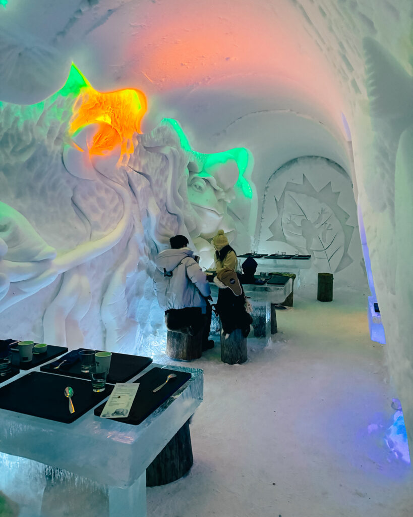 30 of the Best Things to Do in Rovaniemi, Finland, This Winter 49 Snowman World Frog Snow Sculpture at Snow Restaurant in winter wonderland.