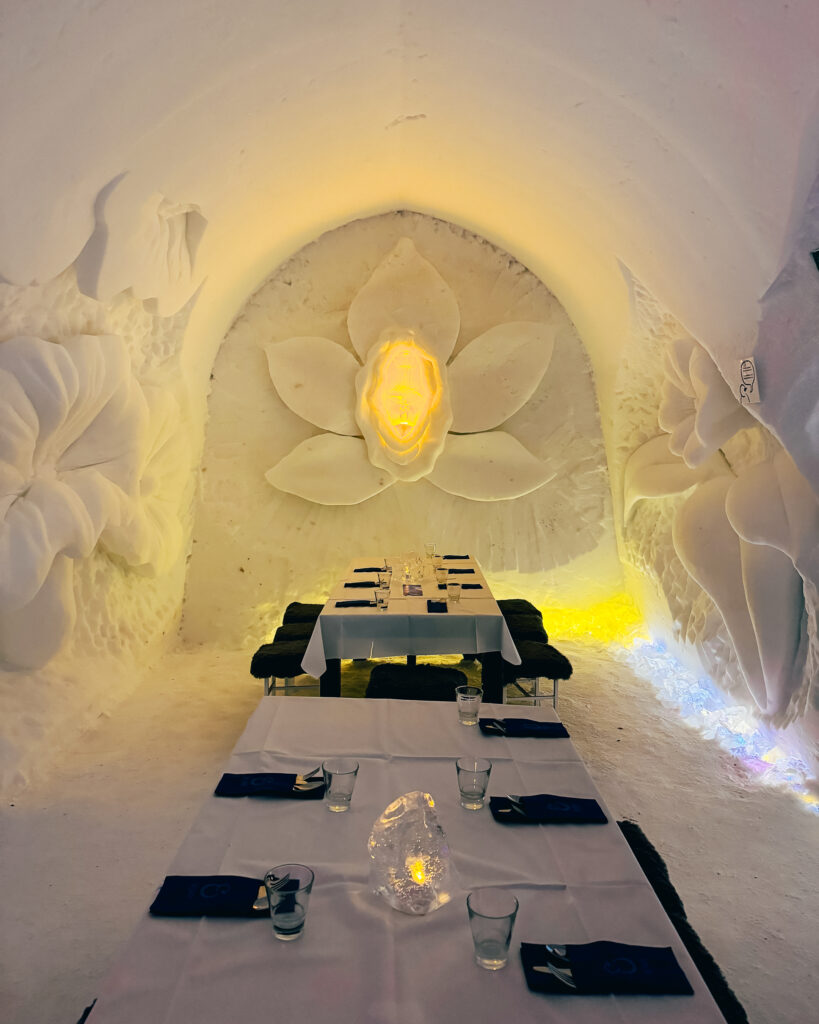 Are These 10 Rovaniemi Restaurants Worth Trying? Arctic Cuisine Dining Guide 32 Yellow flowers blooming in snowy scenery at Snow Restaurant in Snowman World, Rovaniemi.