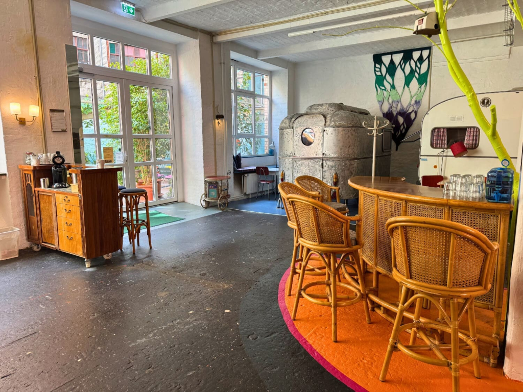 Hüttenpalast Berlin: Reviewing This Caravan Hotel as a Solo Female Traveler 31 huttenpalast berlin lounge rattan bar vintage campers
