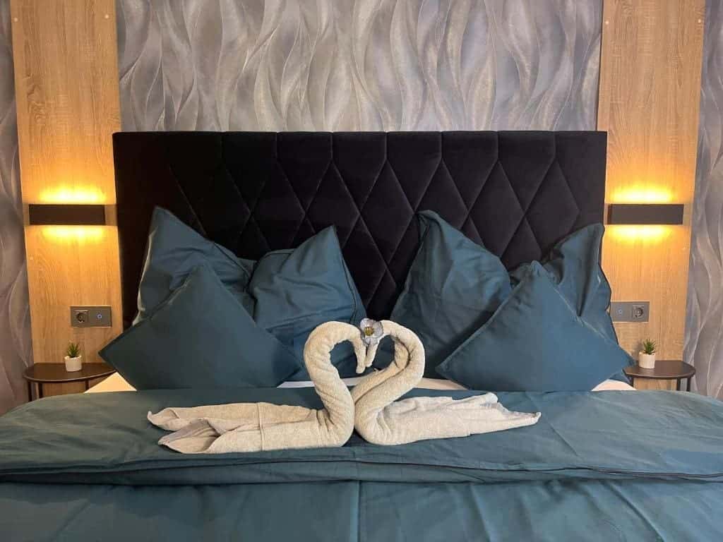 Where to Stay in Vienna, Austria: My Favorite Areas + Best Budget Hotels 113 fruhstuckspension caltun towel swans turndown fischamend austria