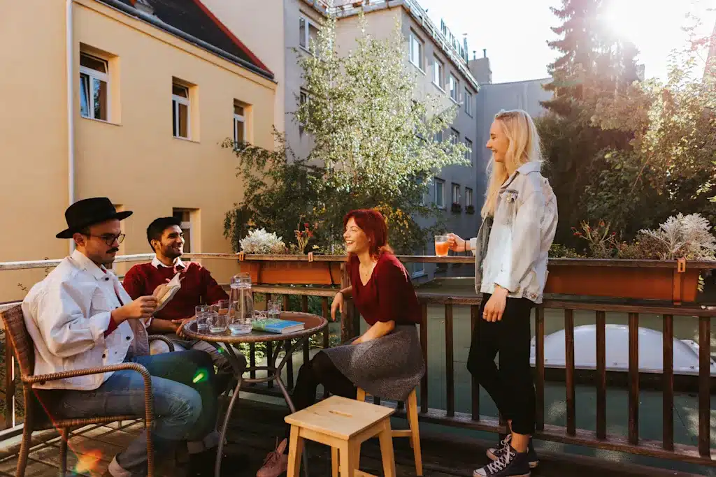 Where to Stay in Vienna, Austria: My Favorite Areas + Best Budget Hotels 93 hostel ruthensteiner balcony guests socializing vienna austria