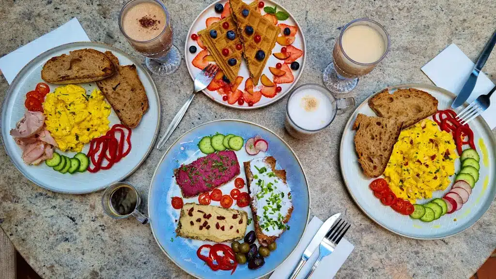 Where to Stay in Vienna, Austria: My Favorite Areas + Best Budget Hotels 95 hostel ruthensteiner brunch spread eggs waffles vienna austria