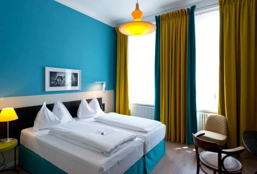 Where to Stay in Vienna, Austria: My Favorite Areas + Best Budget Hotels 64 hotel beethoven wien bedroom turquoise wall vienna austria