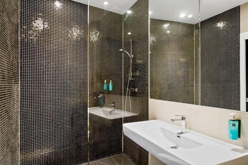 Where to Stay in Vienna, Austria: My Favorite Areas + Best Budget Hotels 78 hotel george vienna bathroom mosaic tile shower vienna austria