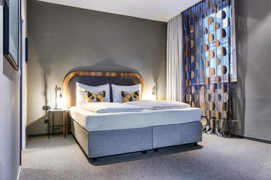 Where to Stay in Vienna, Austria: My Favorite Areas + Best Budget Hotels 79 hotel george vienna bedroom curved headboard vienna austria