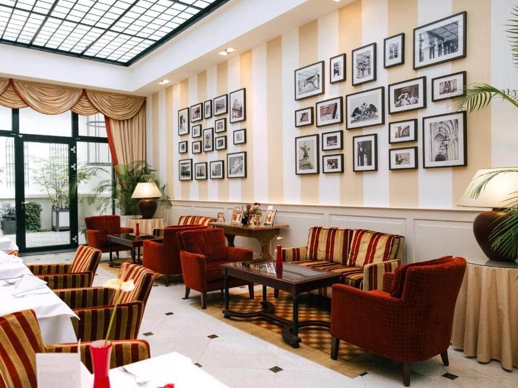 Where to Stay in Vienna, Austria: My Favorite Areas + Best Budget Hotels 35 hotel kaiserhof wien elegant lounge gallery wall vienna austria