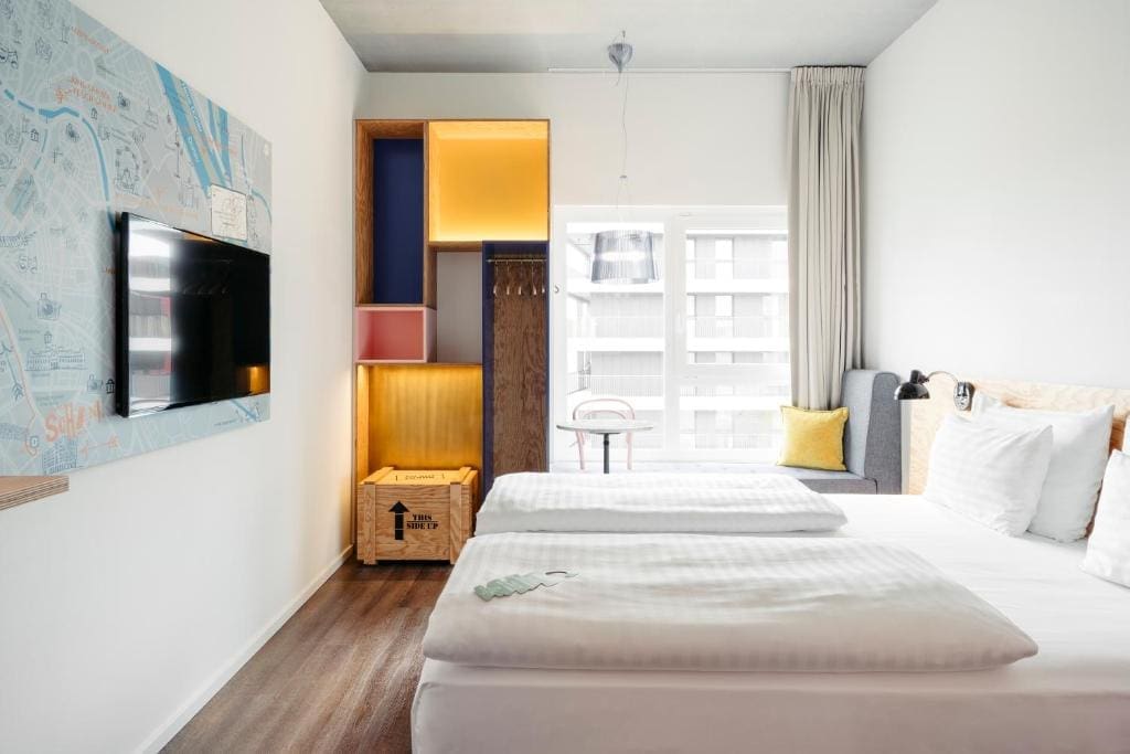 Where to Stay in Vienna, Austria: My Favorite Areas + Best Budget Hotels 108 hotel schani wien hauptbahnhof colorful twin room vienna austria
