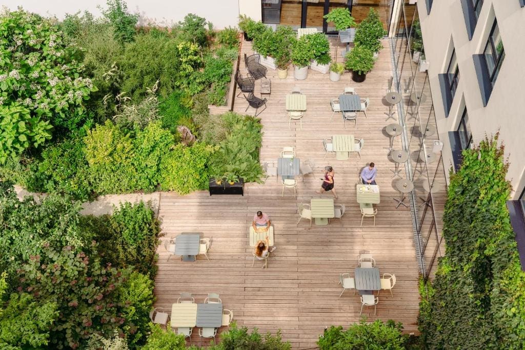 Where to Stay in Vienna, Austria: My Favorite Areas + Best Budget Hotels 107 hotel schani wien hauptbahnhof rooftop terrace aerial vienna austria