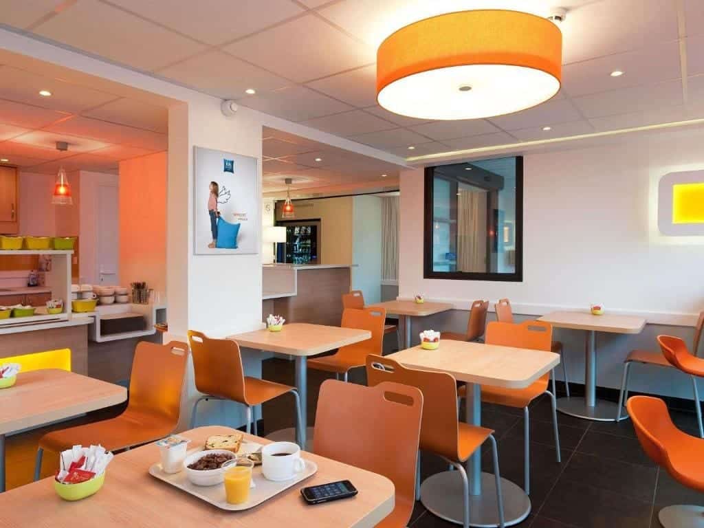 Where to Stay in Vienna, Austria: My Favorite Areas + Best Budget Hotels 54 ibis budget wien messe breakfast dining area vienna austria