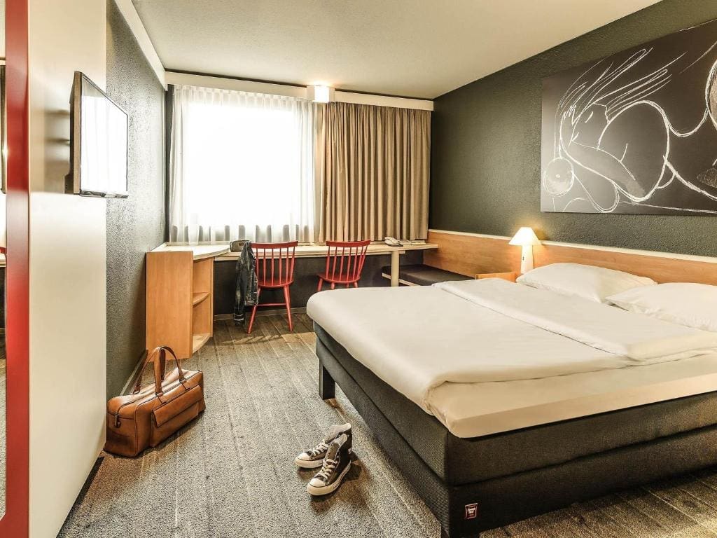 Where to Stay in Vienna, Austria: My Favorite Areas + Best Budget Hotels 60 ibis wien mariahilf hotel room angel wing artwork vienna austria