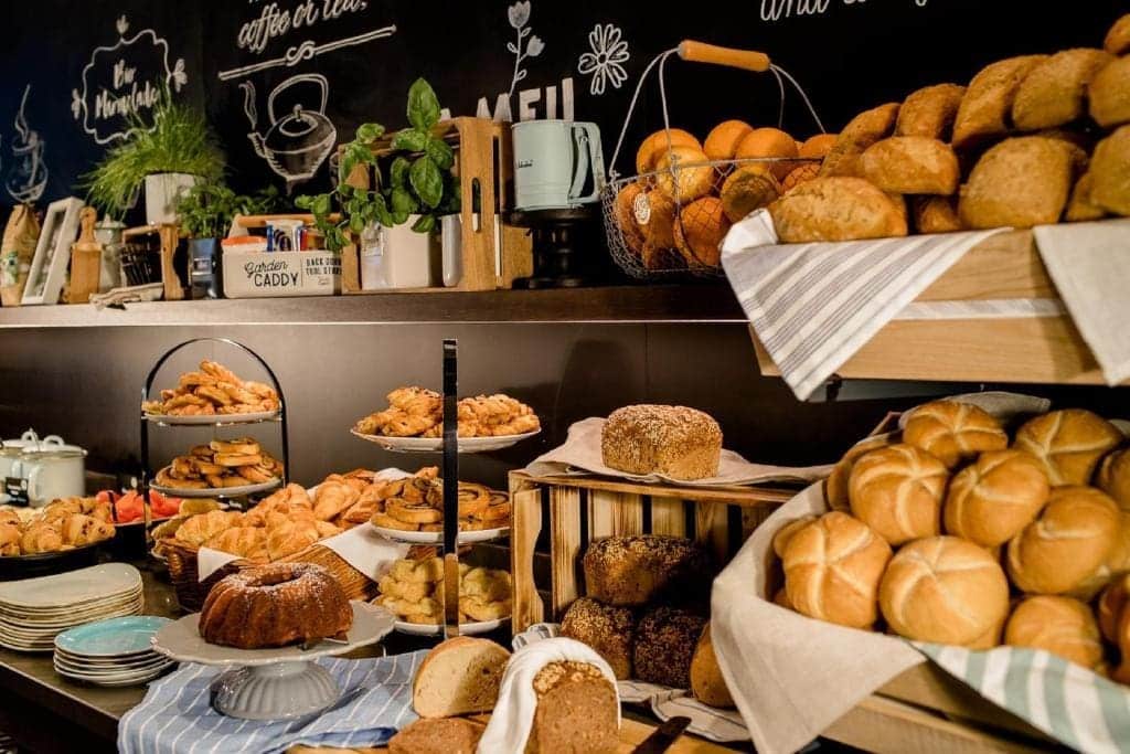 Where to Stay in Vienna, Austria: My Favorite Areas + Best Budget Hotels 33 motel one wien staatsoper breakfast buffet bread pastries vienna austria