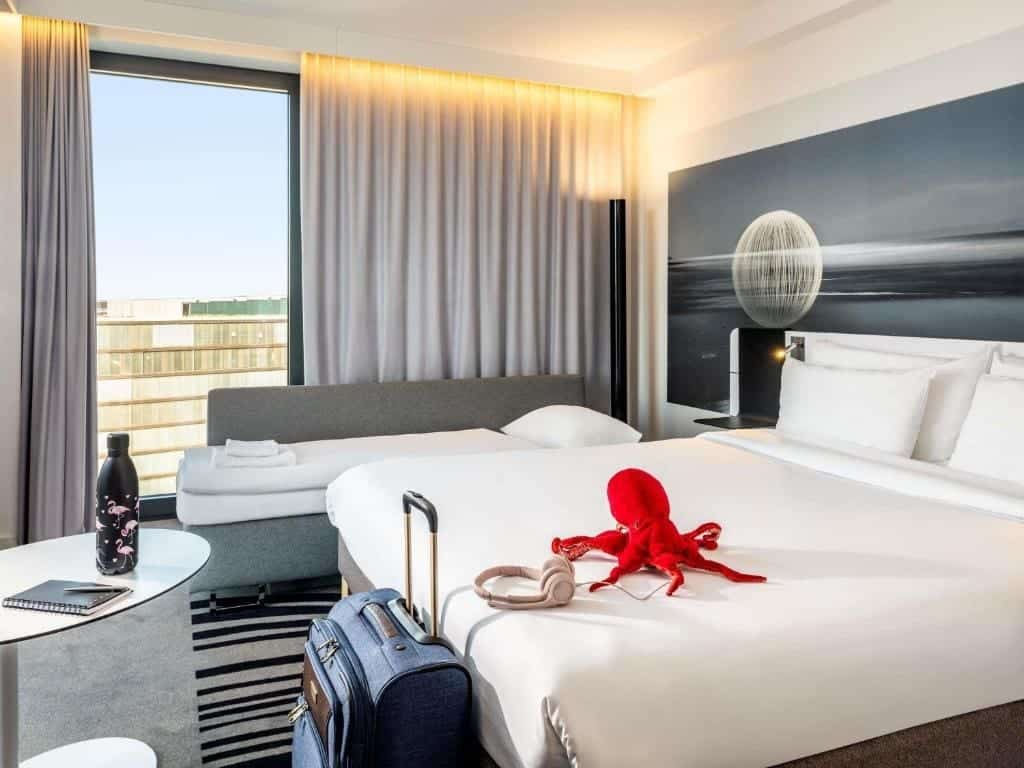 Where to Stay in Vienna, Austria: My Favorite Areas + Best Budget Hotels 104 novotel wien hauptbahnhof bedroom toy octopus vienna austria