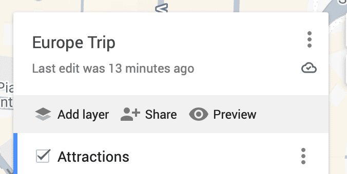 How to Use Google My Maps to Create an Itinerary in 9 Simple Steps 16 A close-up of a Google My Maps left-hand panel showing the Europe Trip map header with Add layer, Share, and Preview options, and the Attractions layer listed below with a checkbox and three-dot menu, indicating the map was last edited 13 minutes ago.